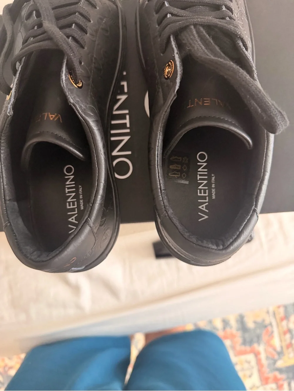 Valentino Men’s Black Leather Low-Top Sneakers with Gold Eyelets